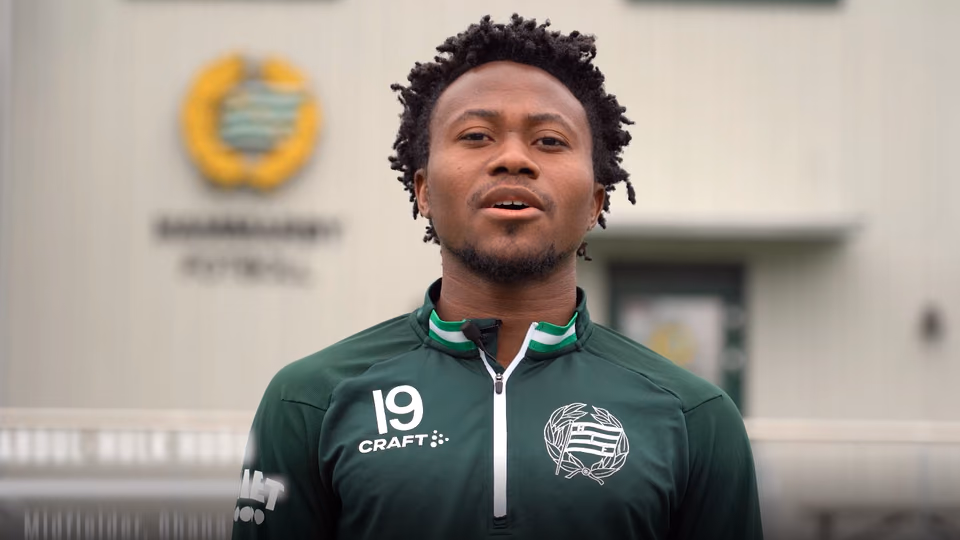 A Hammarby IF player speaking to camera outside the club